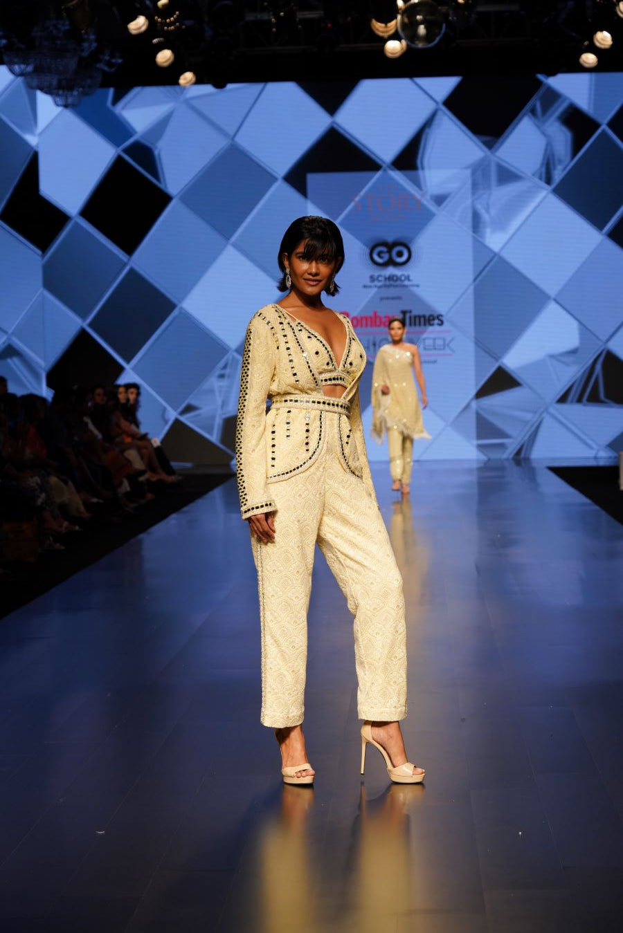 Lemon Mirror Embellished Short Cape, Bralette Top. Belt and Tuxedo Pants